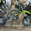 2025 Surron Light Bee Green electric off-road motorcycle featuring 8kW peak power, long-travel suspension, and lightweight aluminum alloy frame